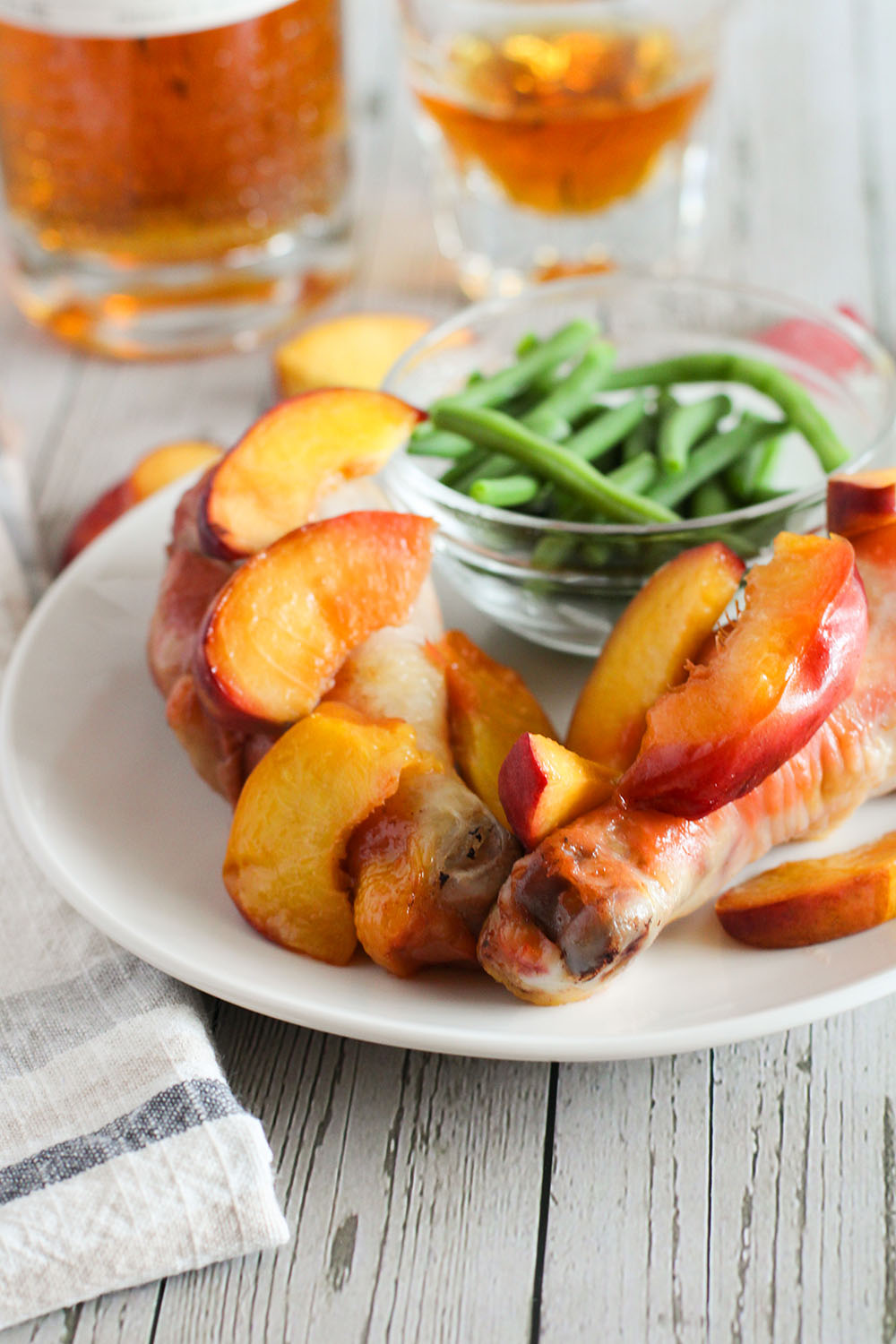 picture of whiskey peach chicken recipe with chicken drumsticks when finished cooking