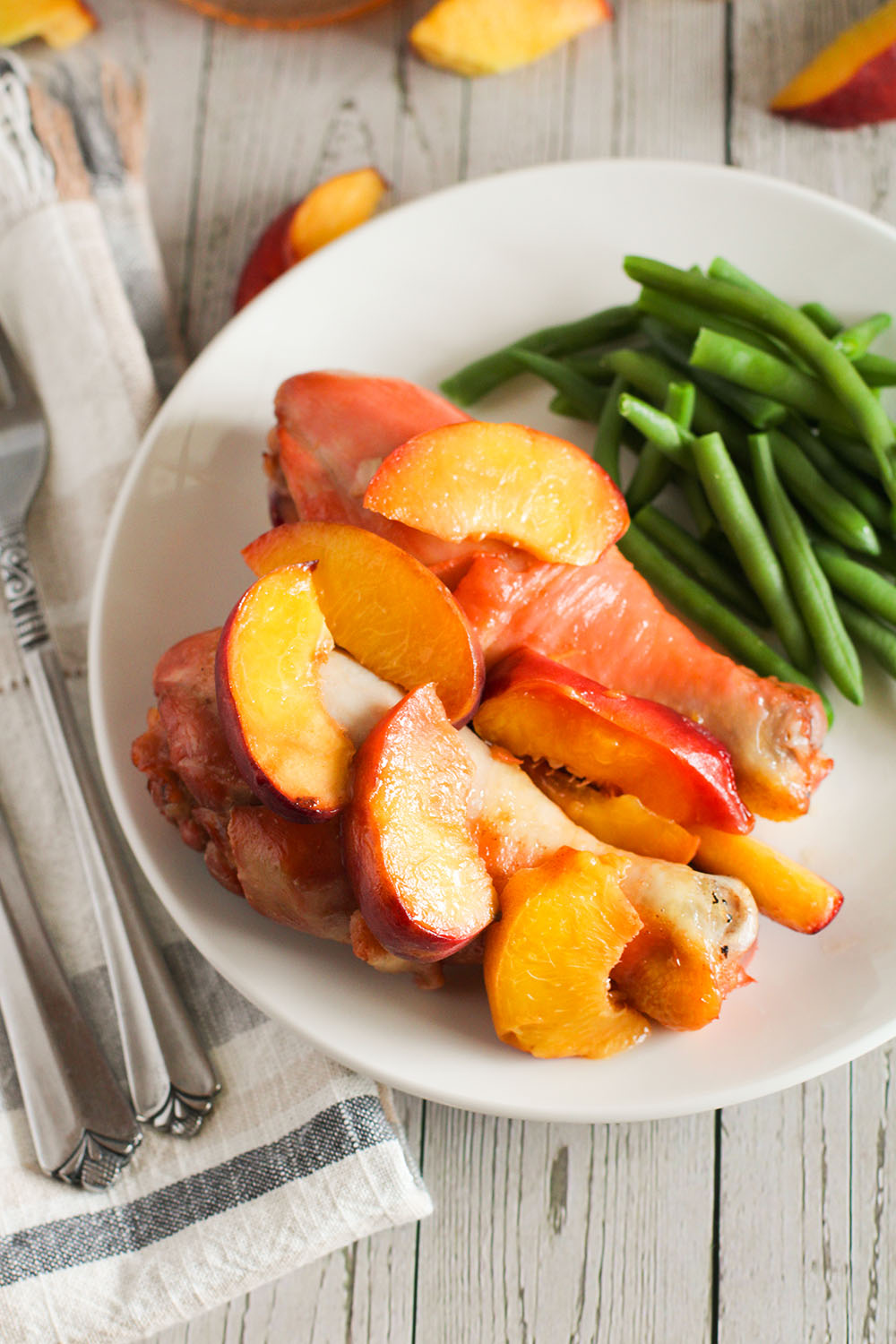 picture of whiskey peach chicken recipe with chicken drumsticks when finished cooking