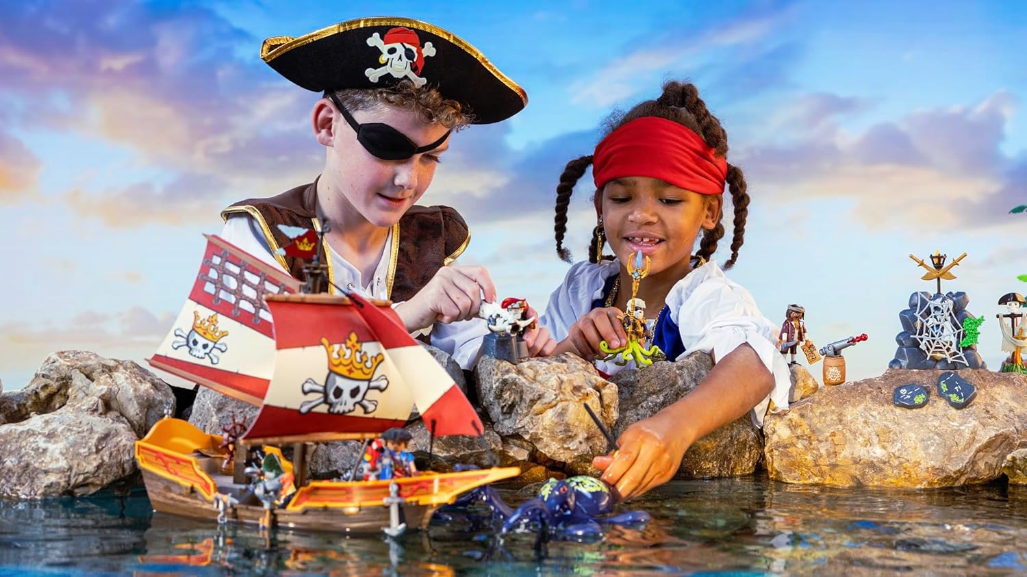 children playing with Playmobil Pirate Ship toy 