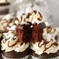 picture of a grouping of hot cocoa cupcakes on a table