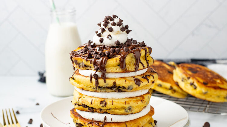 picture of Chocolate Chip Pancakes with delightful chocolate sauce, chips, and fluffy cream